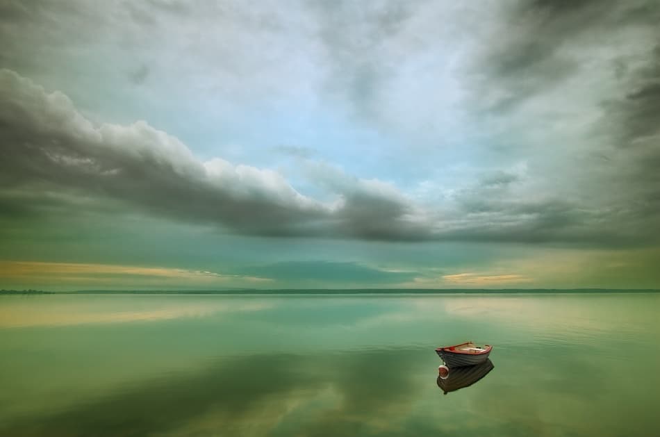 Empty Boat, Still Lake by Krzysztof Browko — canvas wall art
