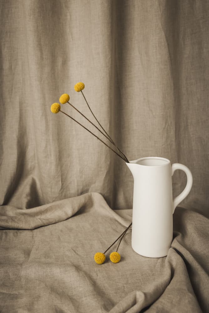 White Pitcher Yellow Flowers by Mayra Pama — canvas wall art