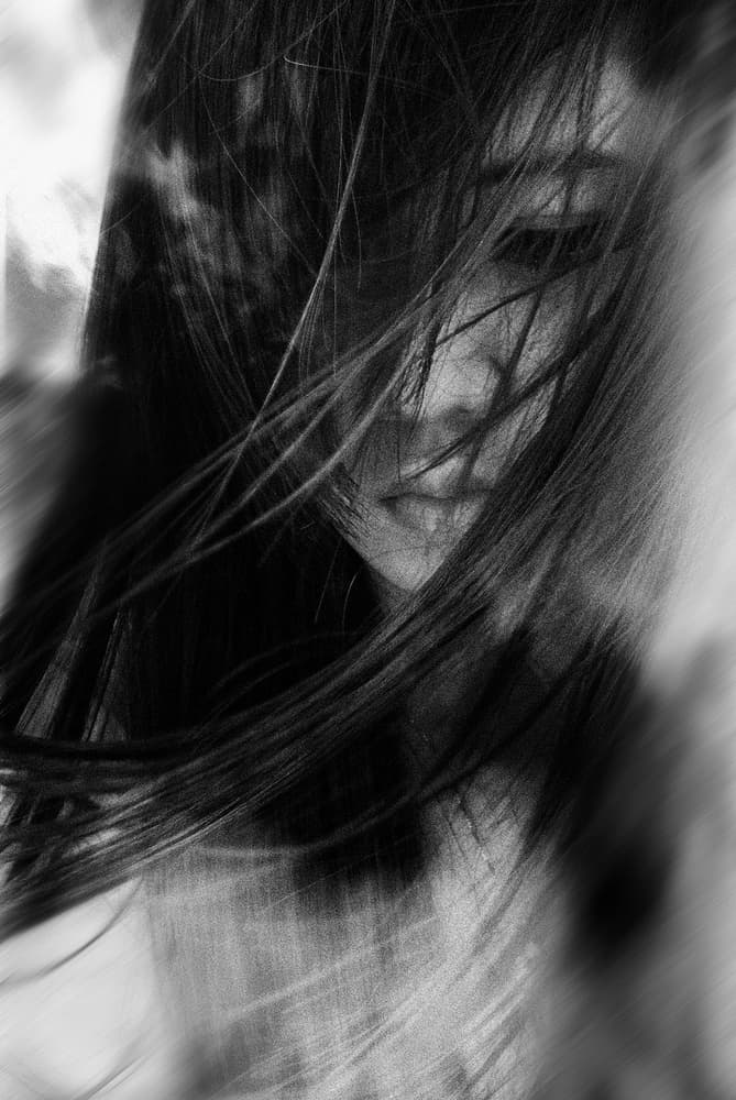 Pensive Woman Dark Hair by Yusuf Afandi — canvas wall art