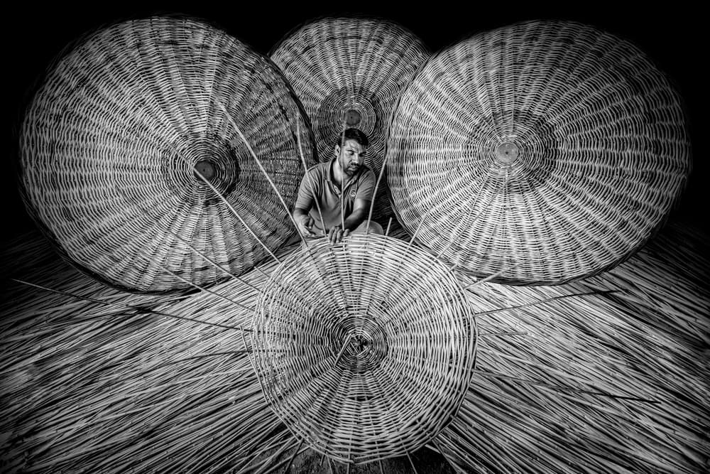 Wicker Weaver At Work by Yasemin Bakan — canvas wall art