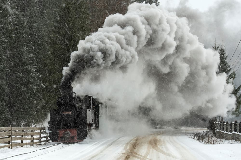 Powerful Winter Steam Train by Vlad Dumitrescu — canvas wall art