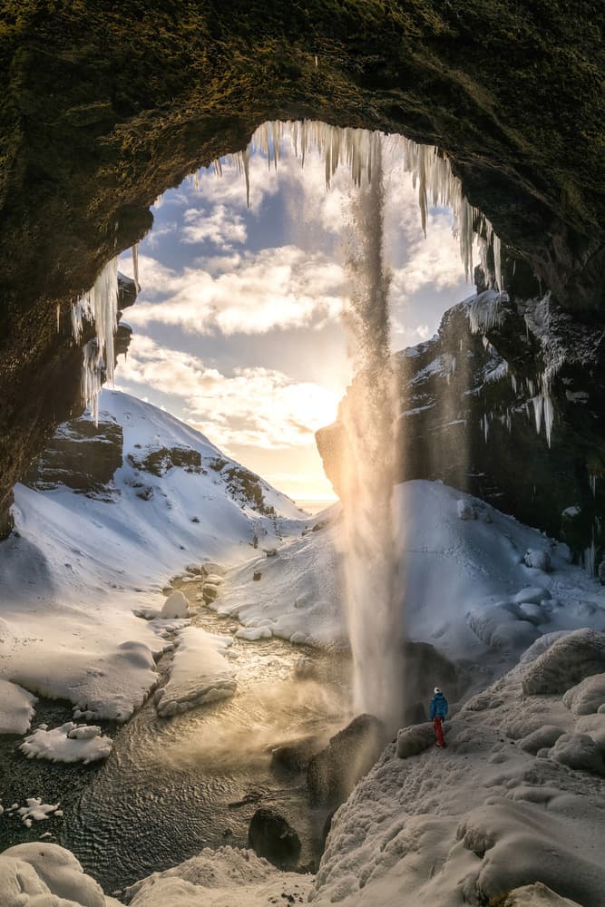 Sunlit Ice Cave Waterfall by Álvaro Pérez &amp Jose M. Pérez. Brothers — canvas wall art