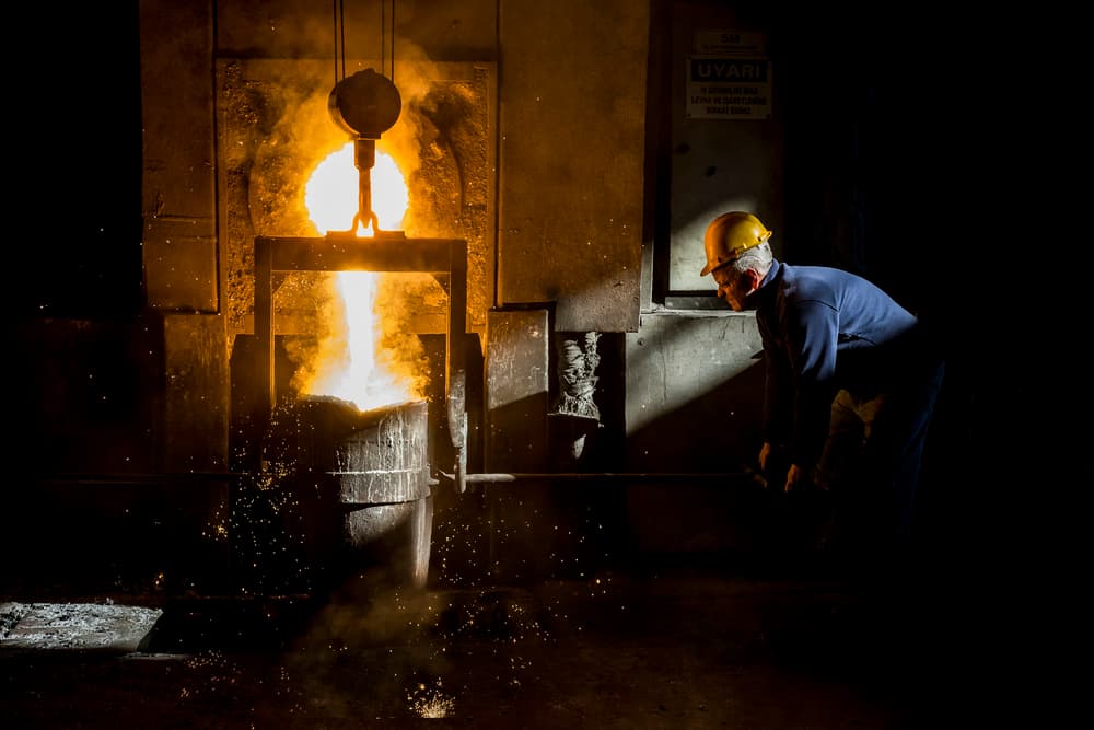 Foundry Worker Casting Metal by Yasemin Bakan — canvas wall art