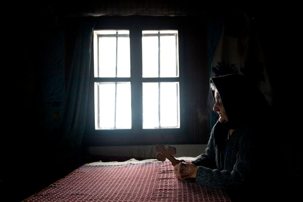 Prayer By Window Light by Vlad Dumitrescu — canvas wall art