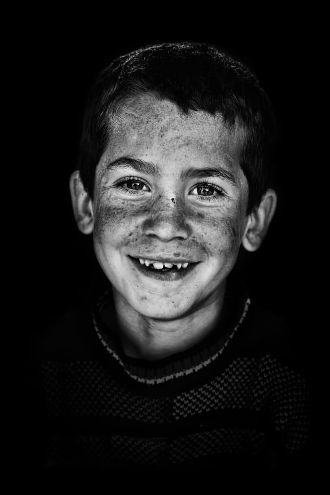 Joyful Boy Portrait by Yasemin Bakan — canvas wall art