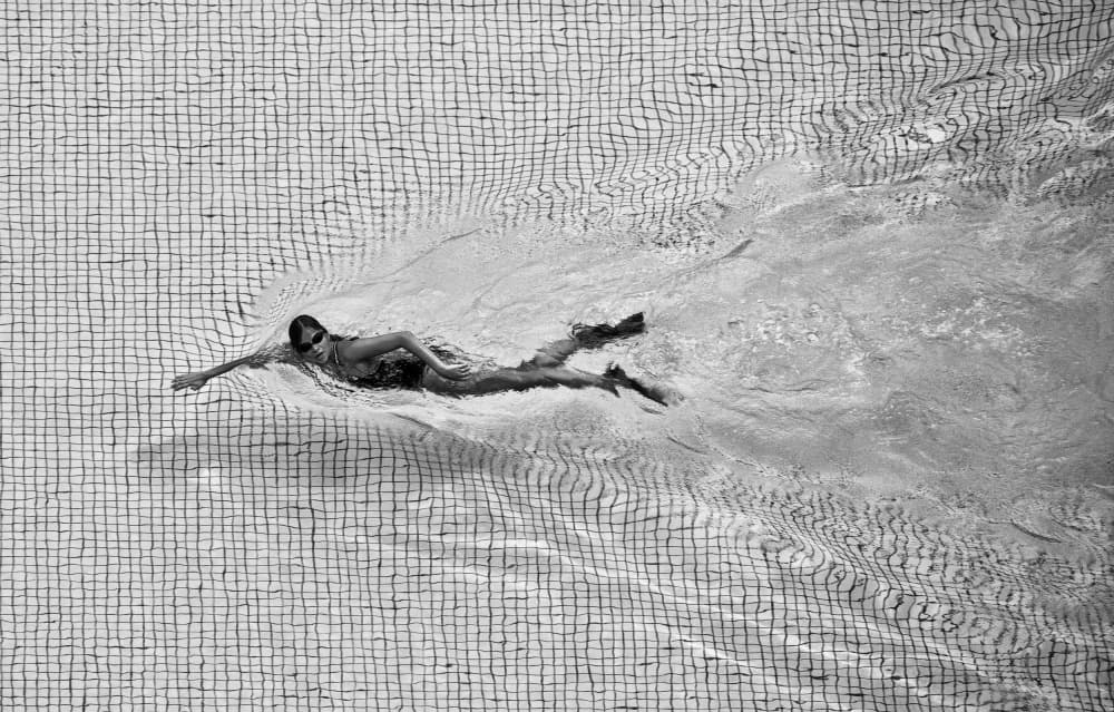 Dynamic Pool Swimmer by C.S. Tjandra — canvas wall art