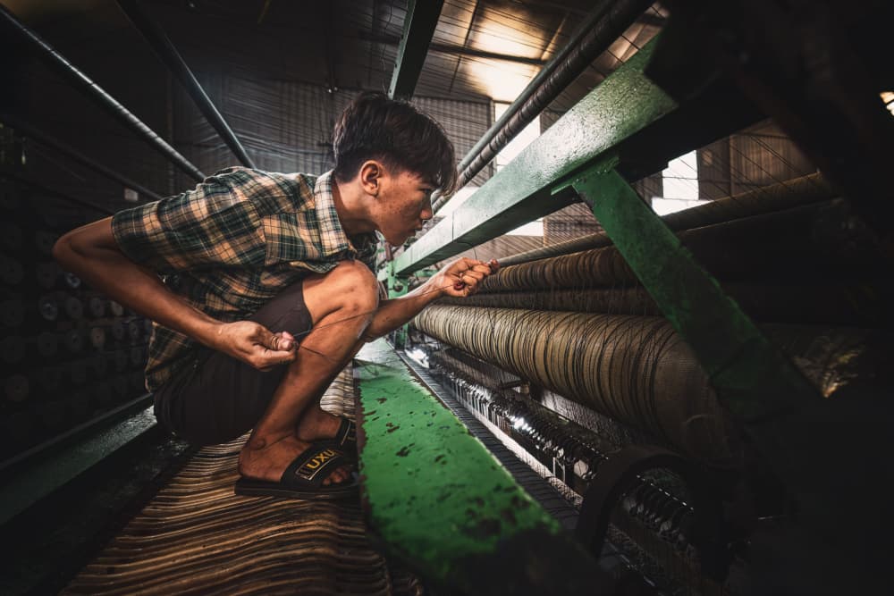 Focused Factory Worker by Marco Tagliarino — canvas wall art
