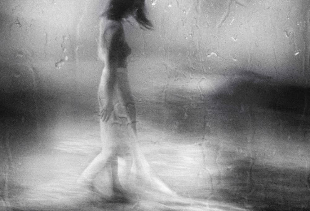 Blurred Woman In Rain by Charlaine Gerber — canvas wall art