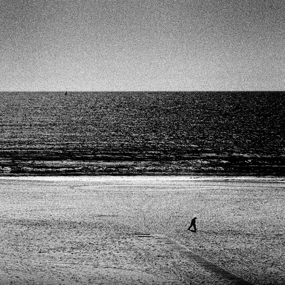 Lone Figure Beach Walk by Paulo Abrantes — canvas wall art