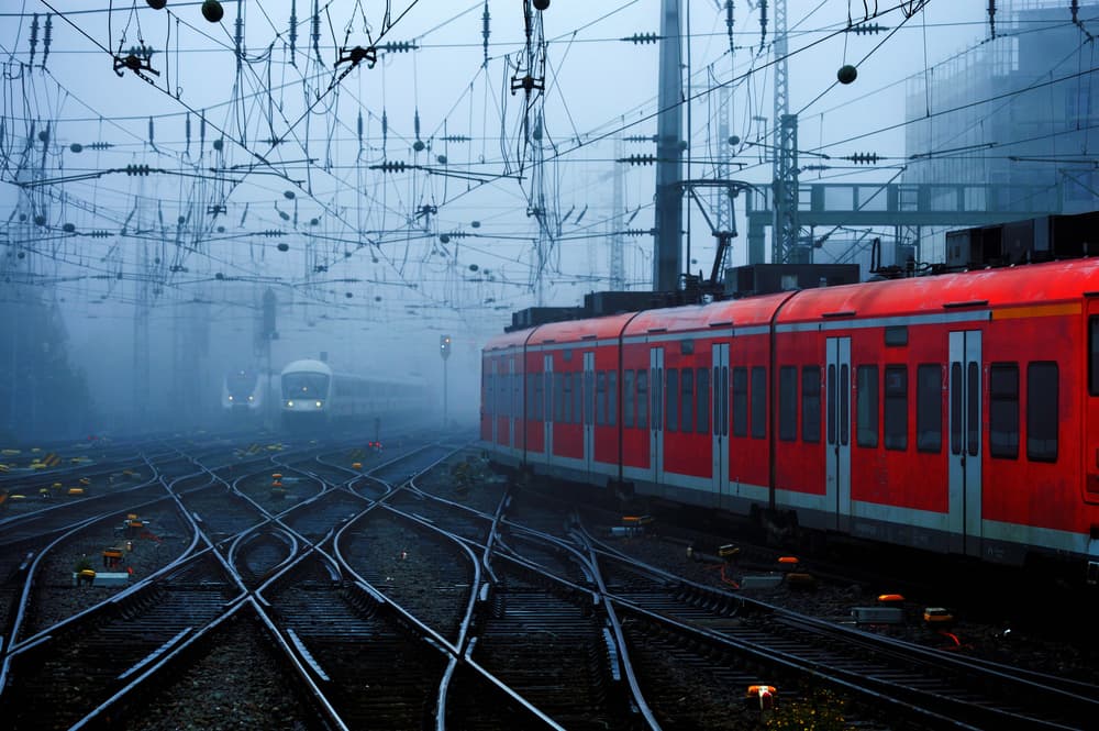 Red Train Misty Tracks by Alexander Buss — canvas wall art
