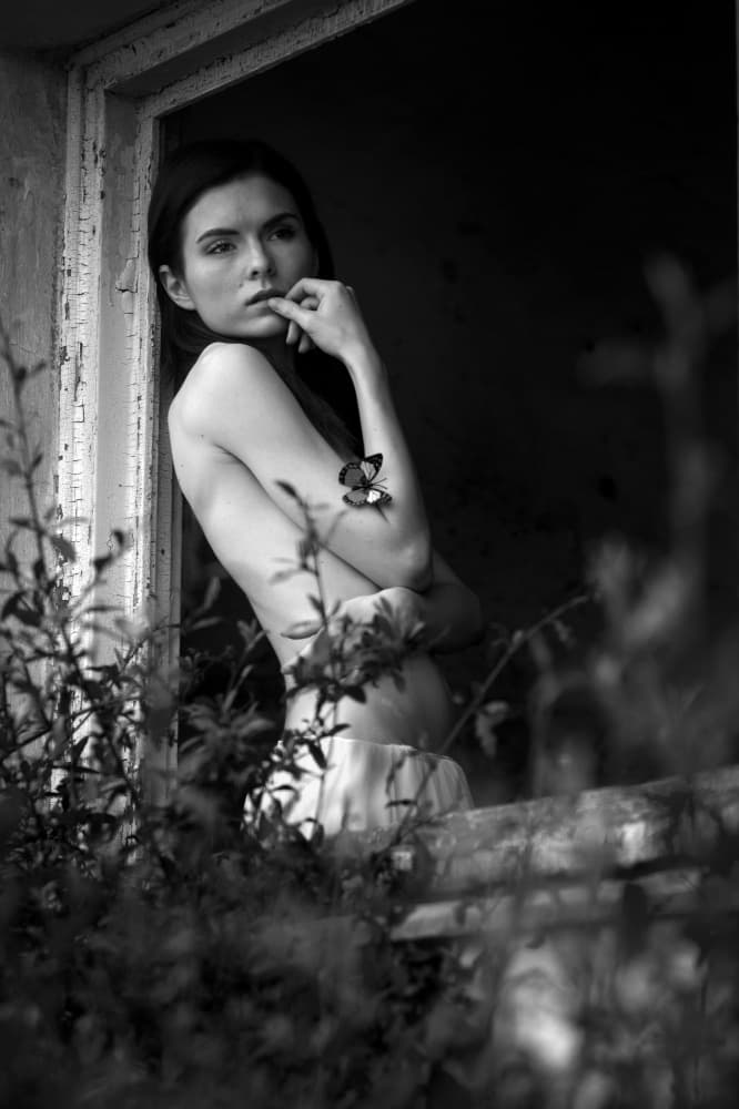 Pensive Woman Butterfly by Shuki Laufer — canvas wall art