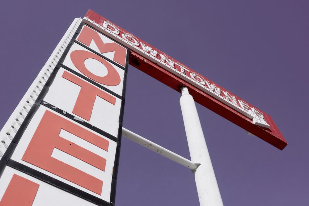 Downtowner Motel Sign by Old Artists Studio III — canvas wall art