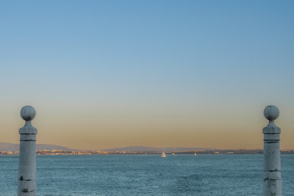 Waterfront Pillars View by Aimee Giles — canvas wall art