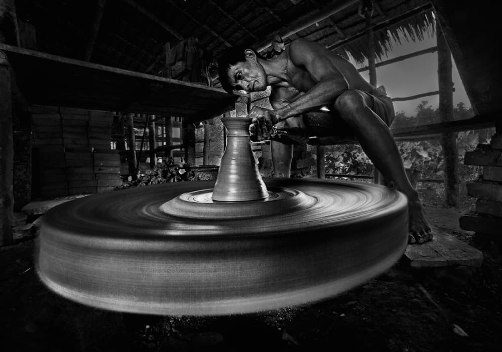 Artisan on Pottery Wheel by dodyherawan — canvas wall art