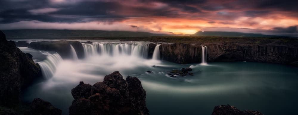 Dramatic Waterfall Sunset by Stefan Mitterwallner — canvas wall art