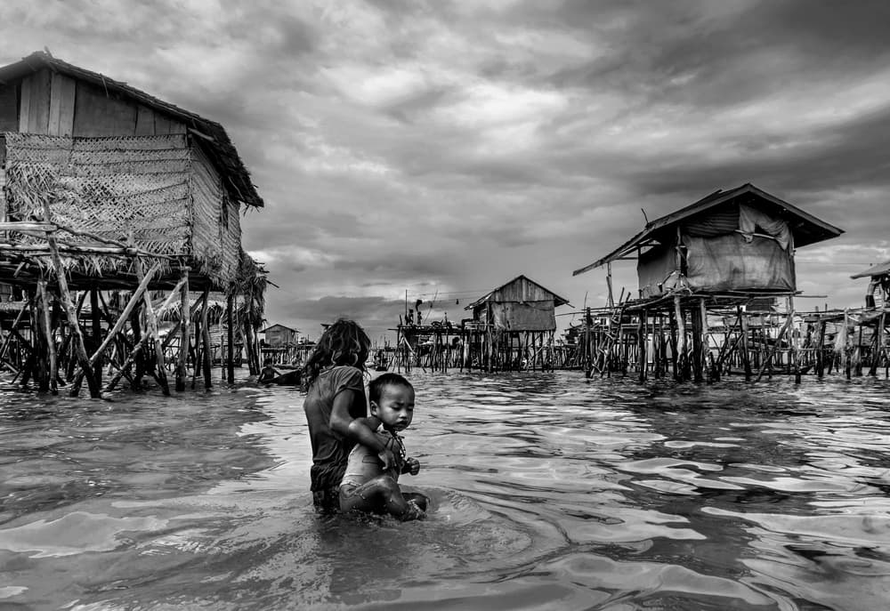 Stilt Village Children by PRADEEP RAJA — canvas wall art