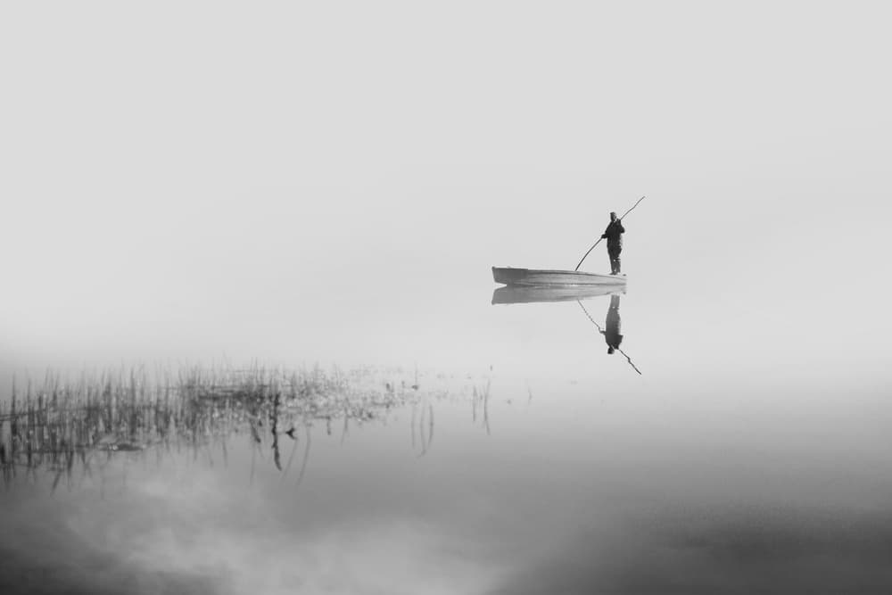 Man On Misty Lake by Yasemin Bakan — canvas wall art
