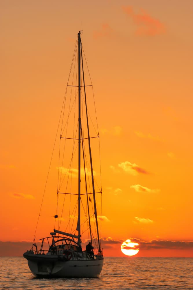 Sailboat Golden Sunset by ADRIAN TUDOSE — canvas wall art
