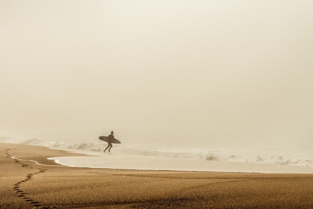 Misty Morning Surfer by Dieter Reichelt — canvas wall art