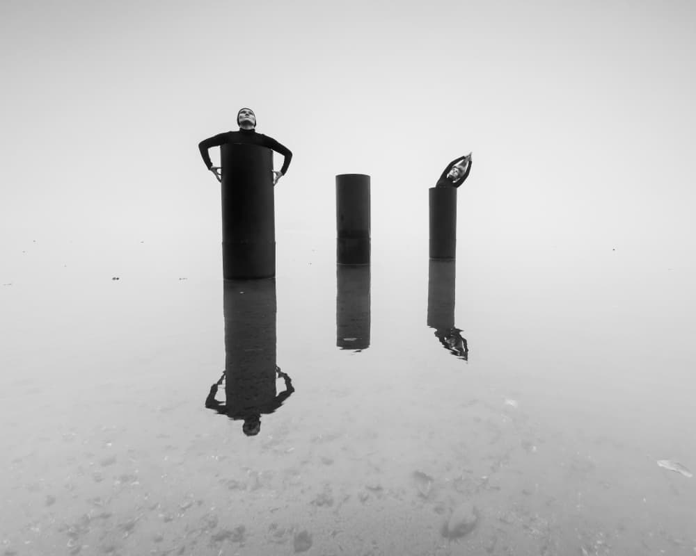 Solitary Figure Still Water by Leszek Paradowski — canvas wall art