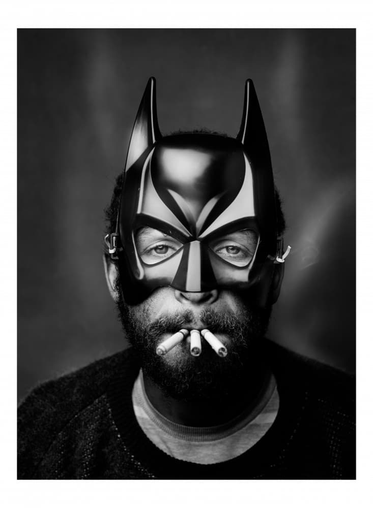 Masked Man Smoking by Thabiet Kamaldien — canvas wall art