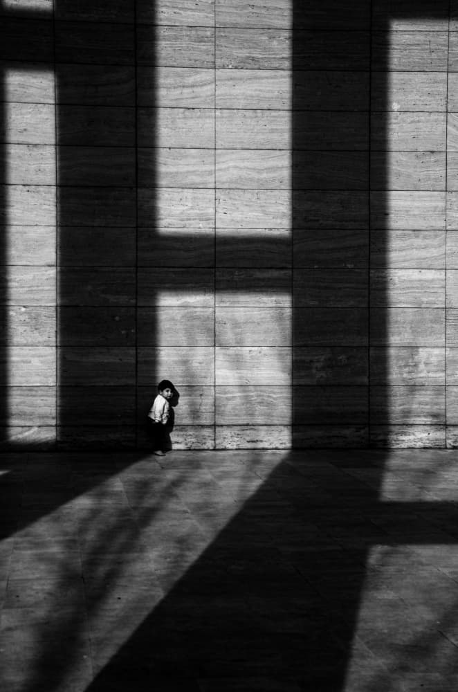 Solitary Figure Geometric Shadows by Bünyamin çadırcı — canvas wall art