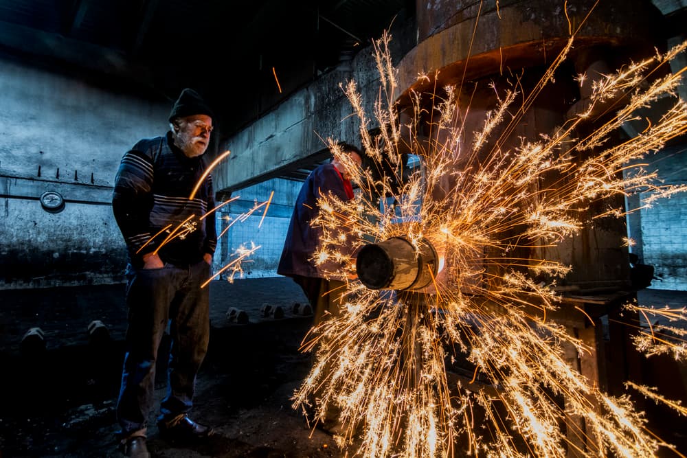 Industrial Sparks In Workshop by Yasemin Bakan — canvas wall art