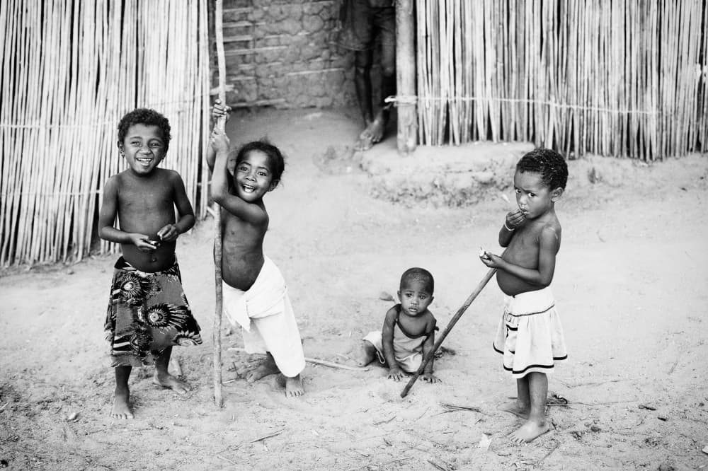 Joyful Village Children by Gina Buliga — canvas wall art