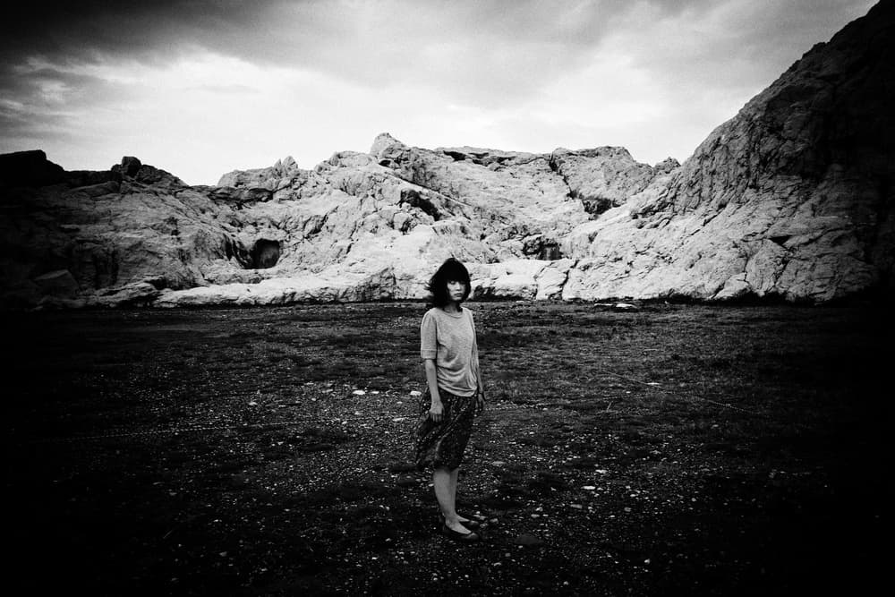 Lone Figure Desert Mountains by Koji Sugimoto — canvas wall art
