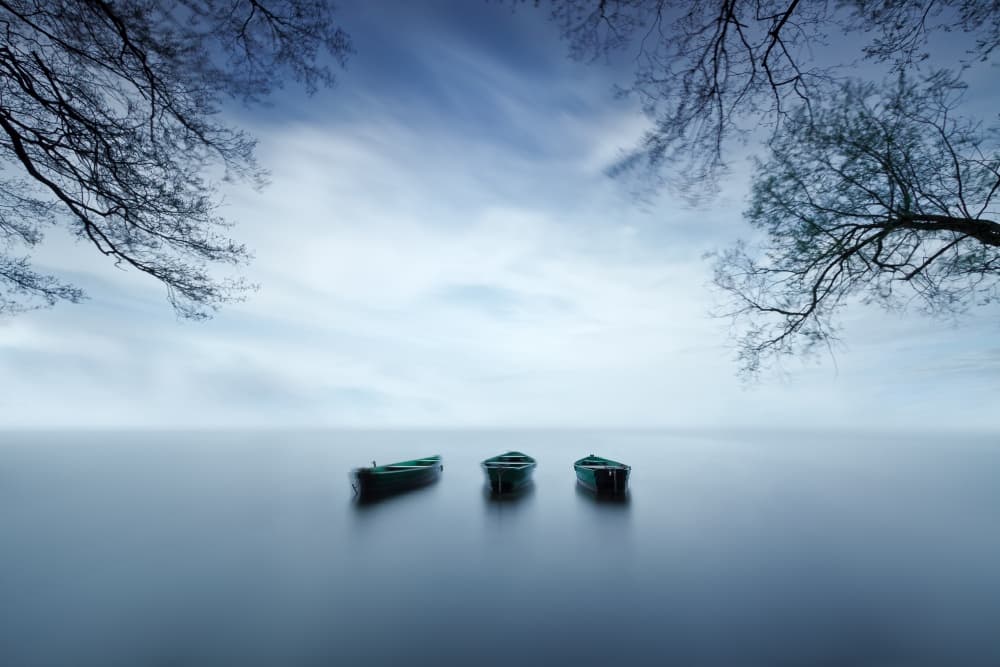 Misty Lake Boats by Izabela Laszewska-Mitrega / Darek Mitręga — canvas wall art