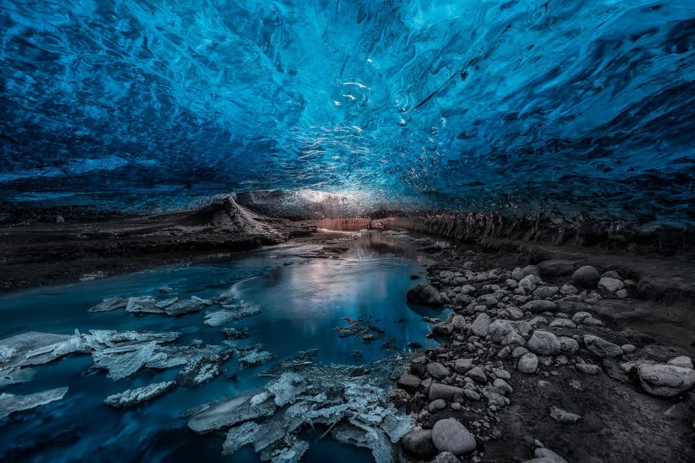 Blue Ice Cave Stream by Javier de la Torre — canvas wall art