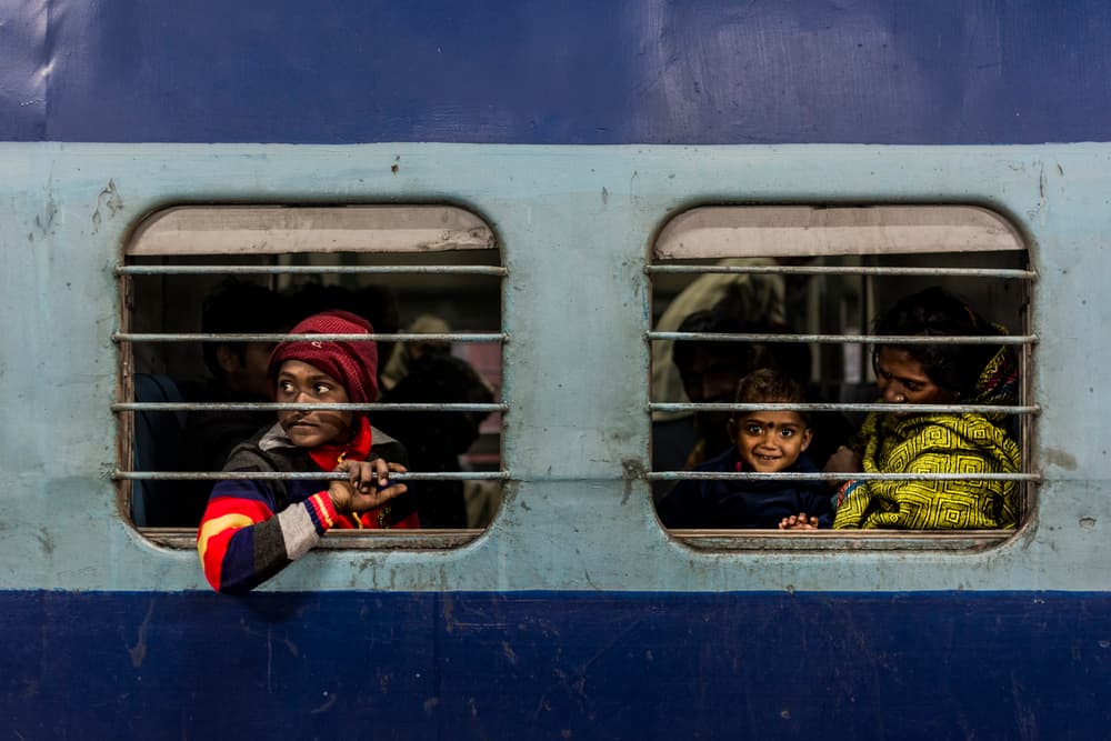 Curious Train Travelers by Yasemin Bakan — canvas wall art