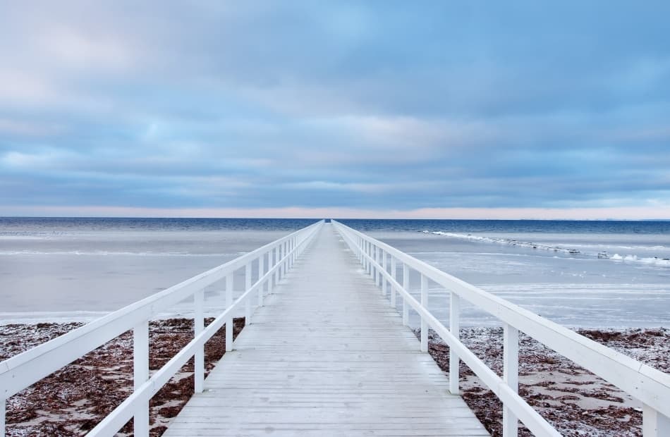 White Pier Winter Ocean by Jacek Oleksinski — canvas wall art