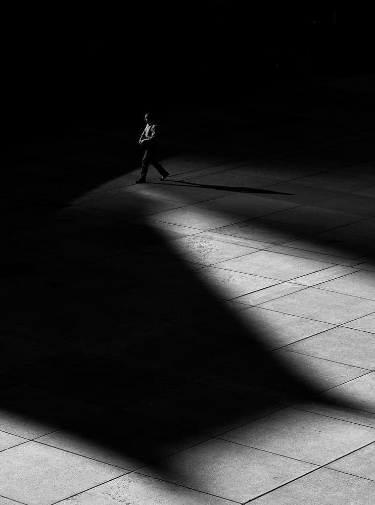 Solitary Man Shadow Light by Jian Wang — canvas wall art