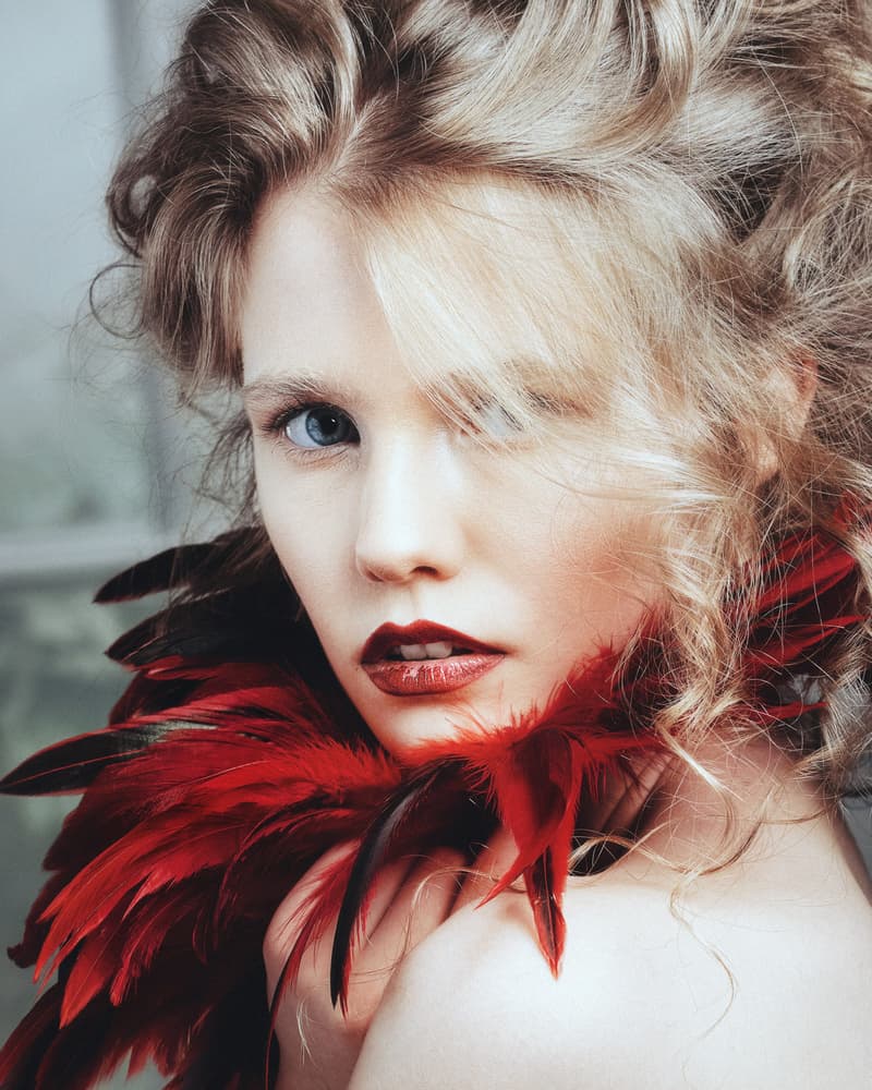 Elegant Woman Red Feathers by Velizar Ivanov — canvas wall art