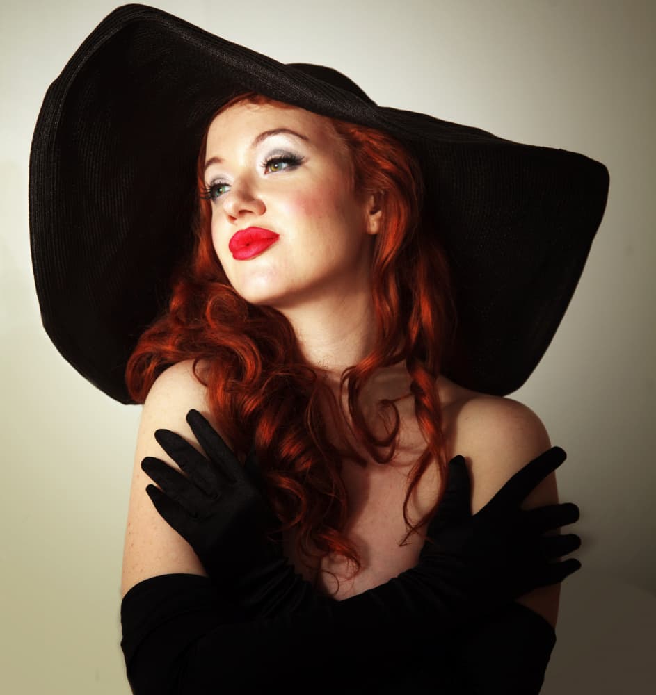 Glamour Redhead Black Hat by Mel Brackstone — canvas wall art