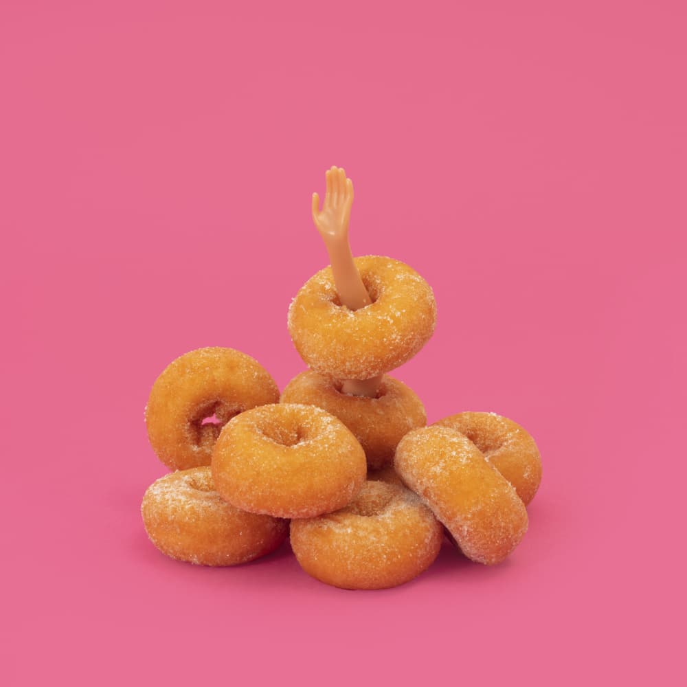 Playful Donut Hand by Julia Ramiro — canvas wall art
