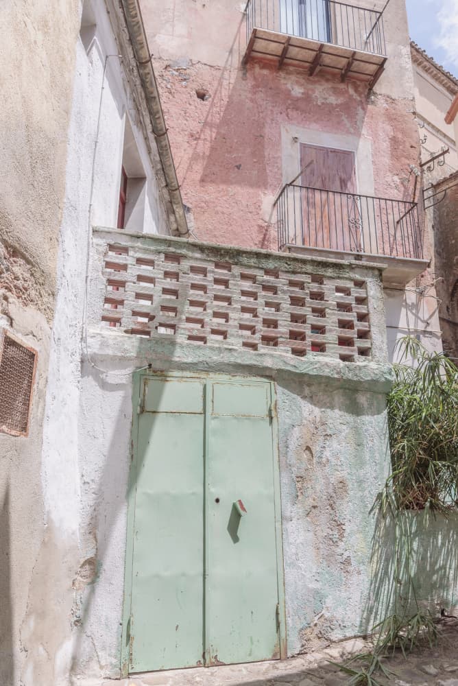 Rustic Green Door Facade by Photolovers — canvas wall art