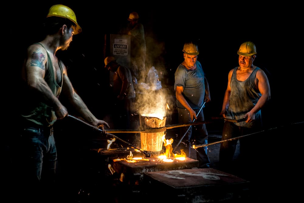 Foundry Workers Casting Metal by Yasemin Bakan — canvas wall art