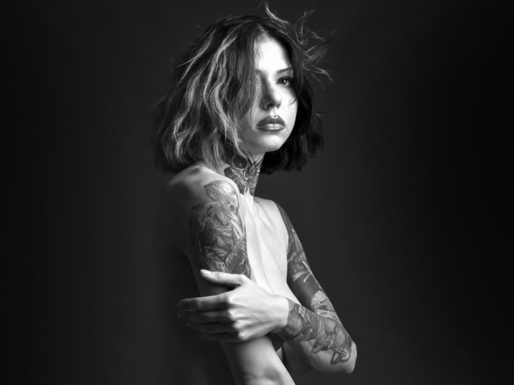 Striking Tattooed Woman by Shuki Laufer — canvas wall art