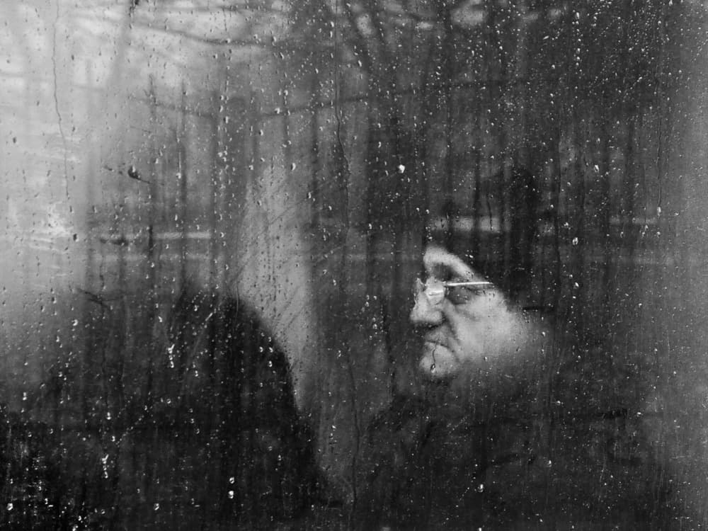 Man Through Rainy Window by Nicoleta Gabor — canvas wall art