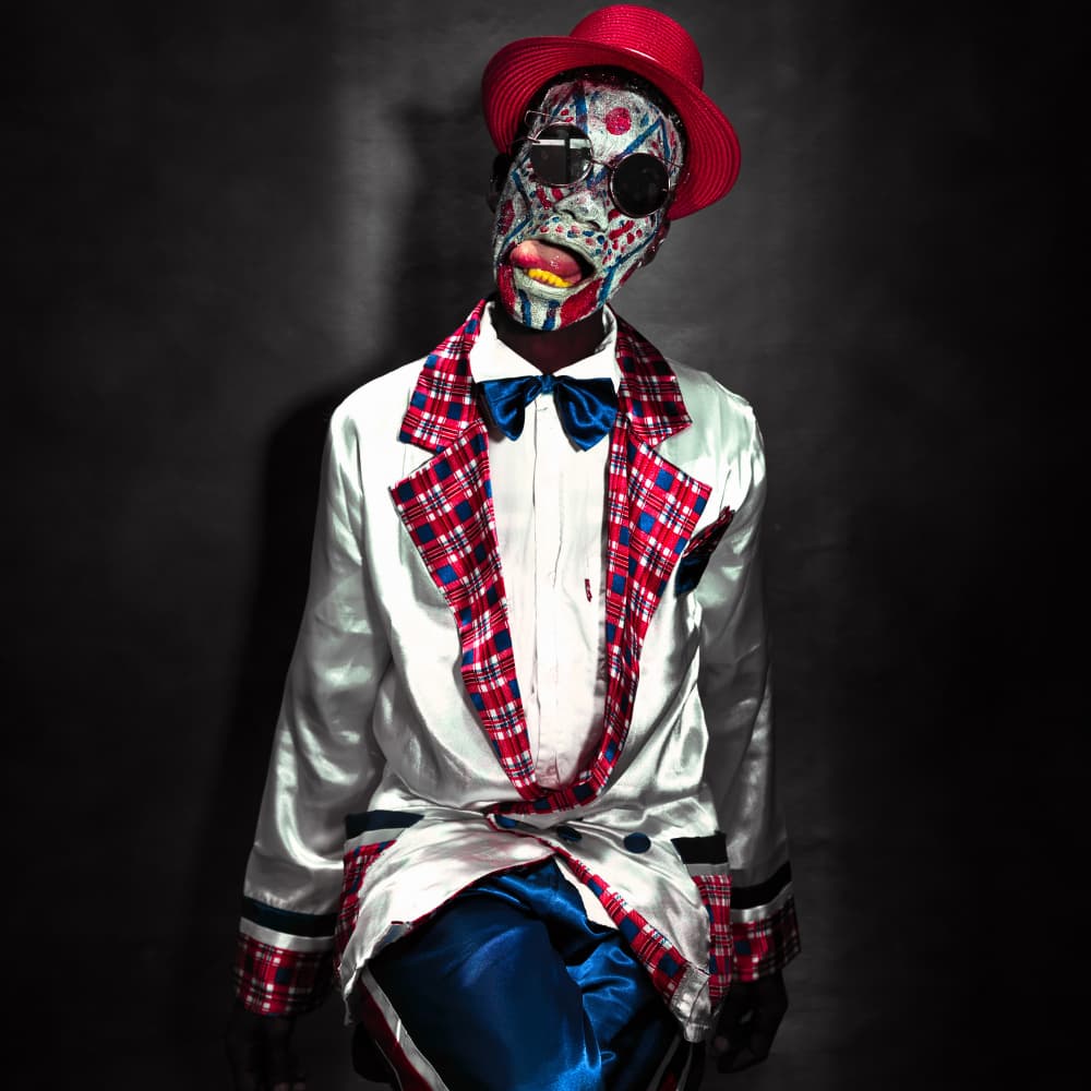 Vibrant Masked Performer by Thabiet Kamaldien — canvas wall art
