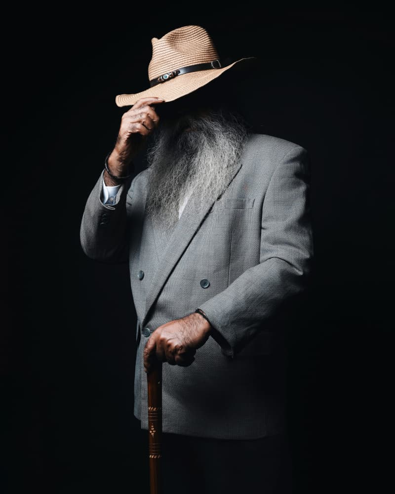 Shadowed Gentleman with Hat by Asep Awaludin — canvas wall art